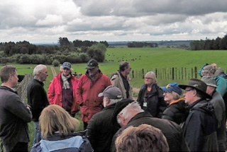 Members of the High Country Group chatting in a paddock