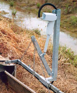 SCADA actuator attached to a farm channel bay outlet.