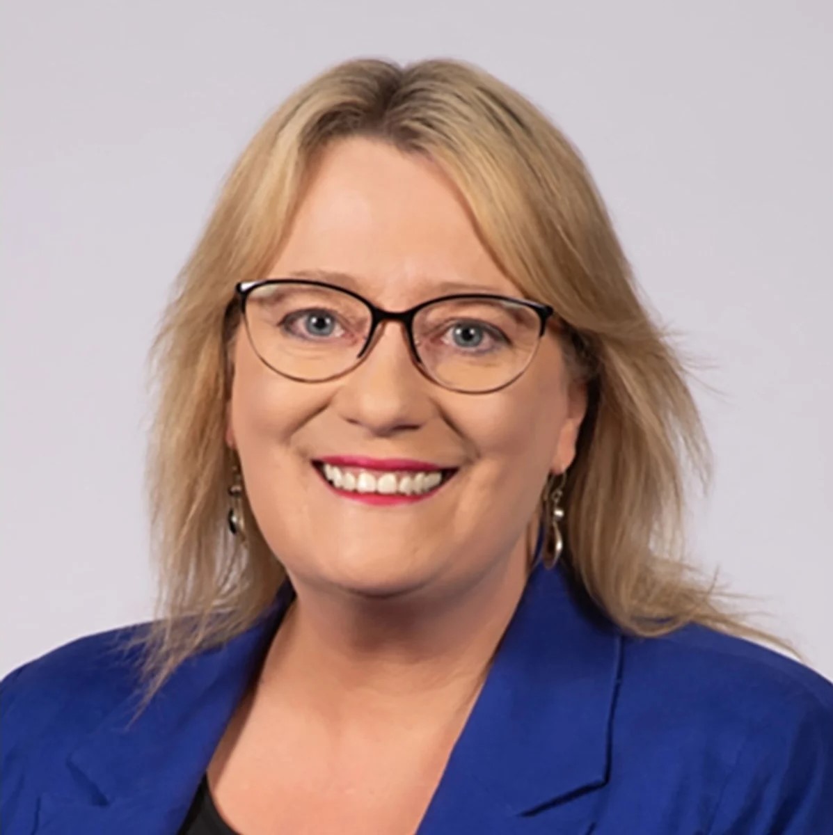 Image is a photograph of Victoria's Minister for Agriculture, Ros Spence