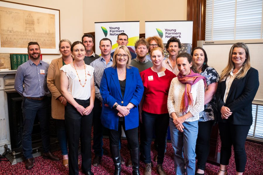 Image of group of 13 young farmers standing with Minister of Agriculture the Hon Ros Spense MP.