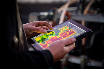 A person holding a tablet
