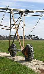 Boombacks with half-throw sprinklers — this part circle pivot has boombacks with valves for travel in both directions.