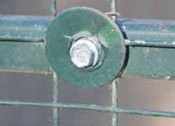 Metal mesh panel fixed with Tec screws and washers, description in next step