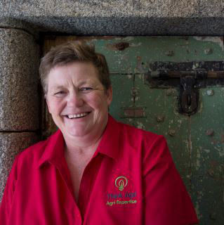Kate with stone doorway in the background