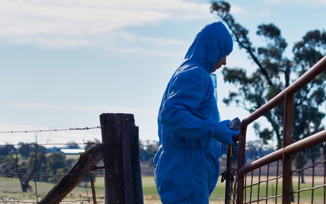 Biosecurity officer wearing PPE