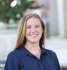 Photo of Amabel Grinter in a blue t-shirt. 