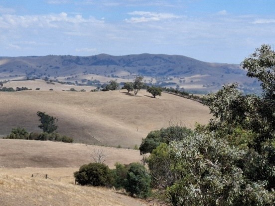 Trough on far hills from tanks