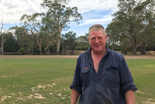 Photo of Richard Edgar standing in a paddock